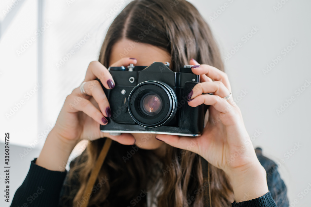 long-haired brunette girl photographed on an old camera long-haired brunette girl photographed on an old camera