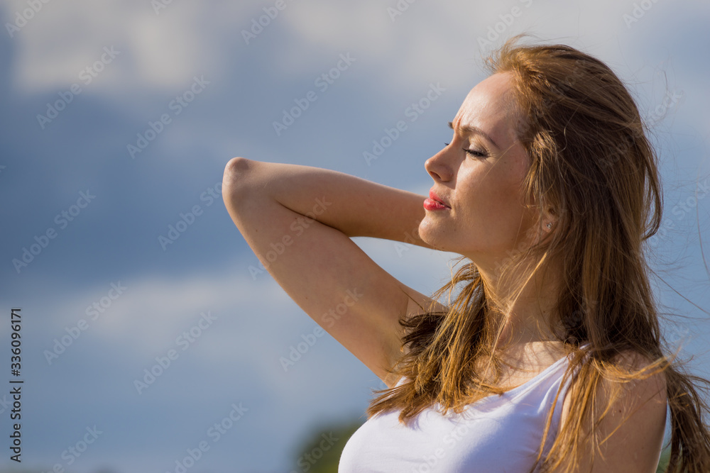 Girl relaxing outdoor enjoying sunlight Girl relaxing outdoor enjoying sunlight