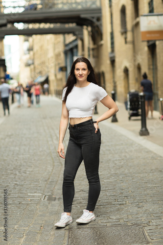 portrait of a beautiful brunette in the street