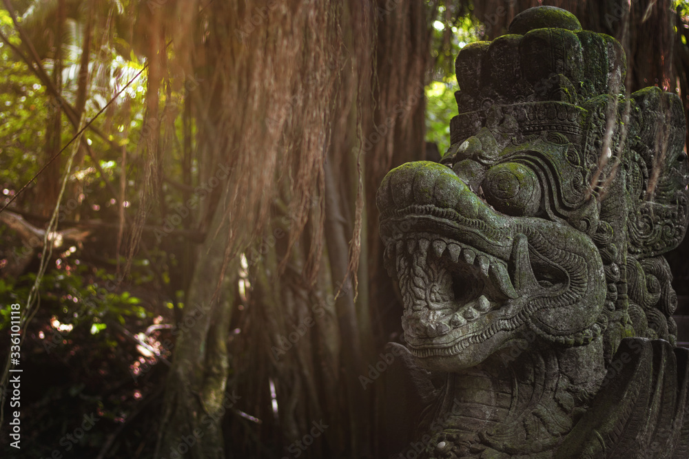 Bali background. Stone sculpture at sacred monkey forest in Ubud, island Bali, Indonesia. Close up - Image