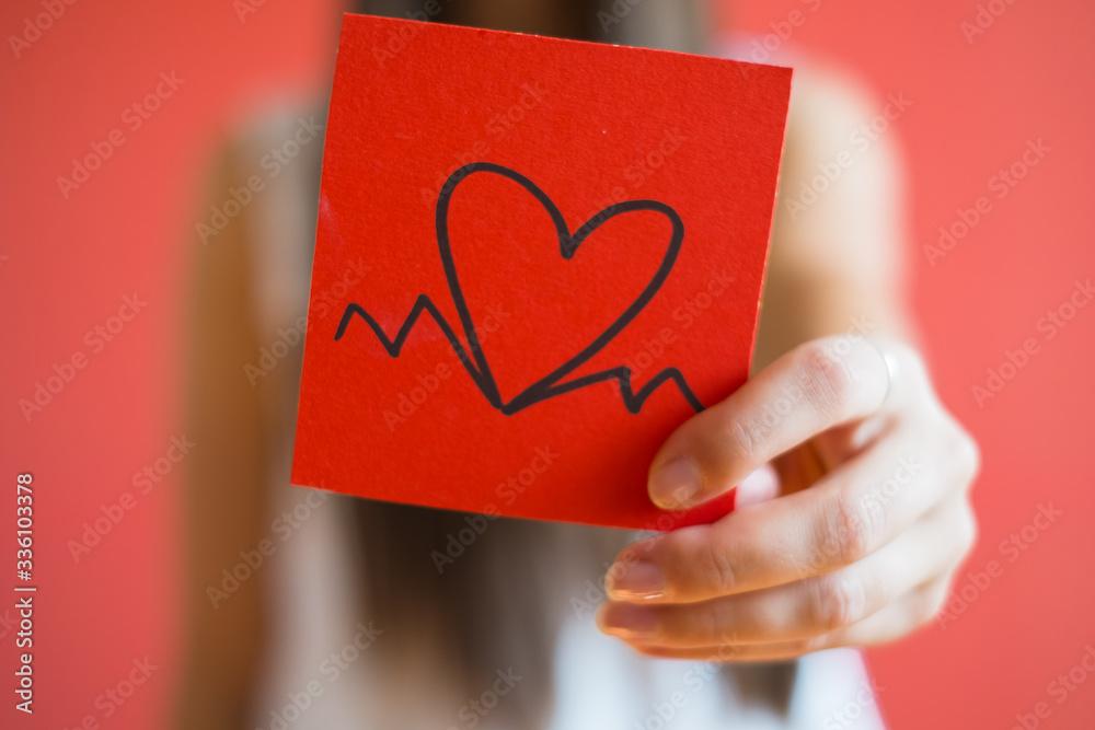 Picture icon paper heart in hand Picture icon paper heart in hand