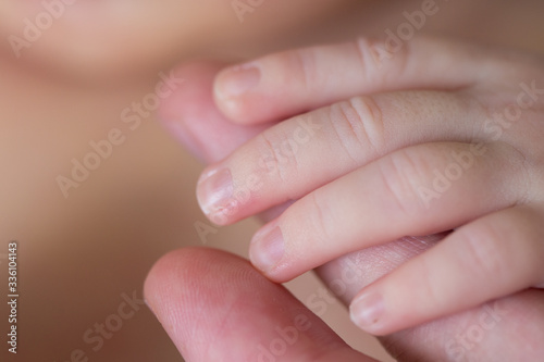 close up of a baby hand