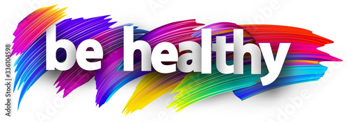 Small letters be healthy sign over brush strokes.