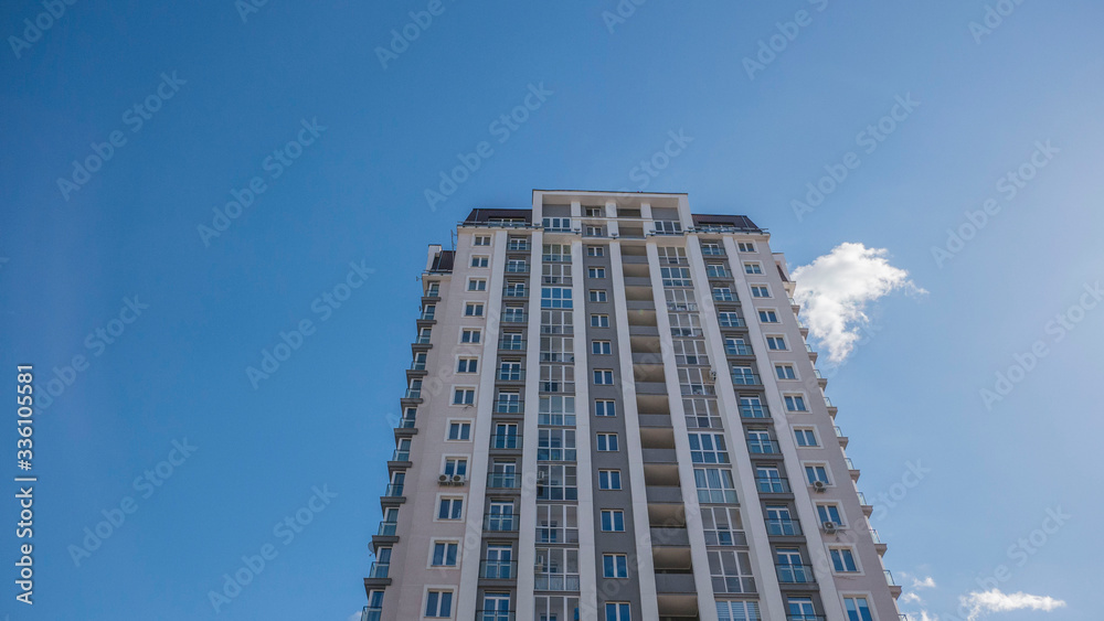 facade of a residential building fragment low angle view against the sky