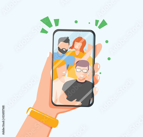 Hands holding mobile phone with happy boys and girls displaying on screen. Friends posing for selfie, group of people