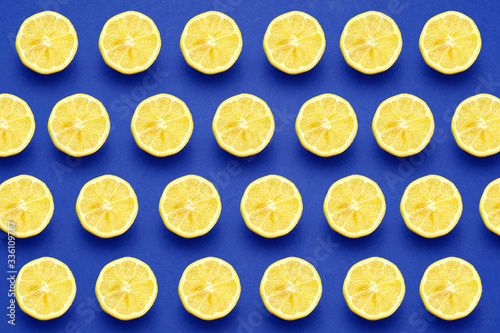 Patron of lemon slices on dark blue background