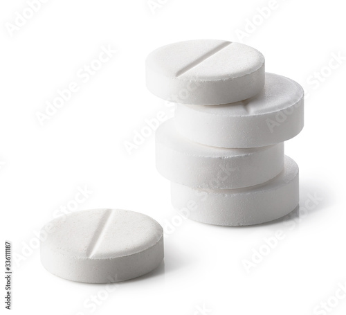 Stack of white round pills or tablets