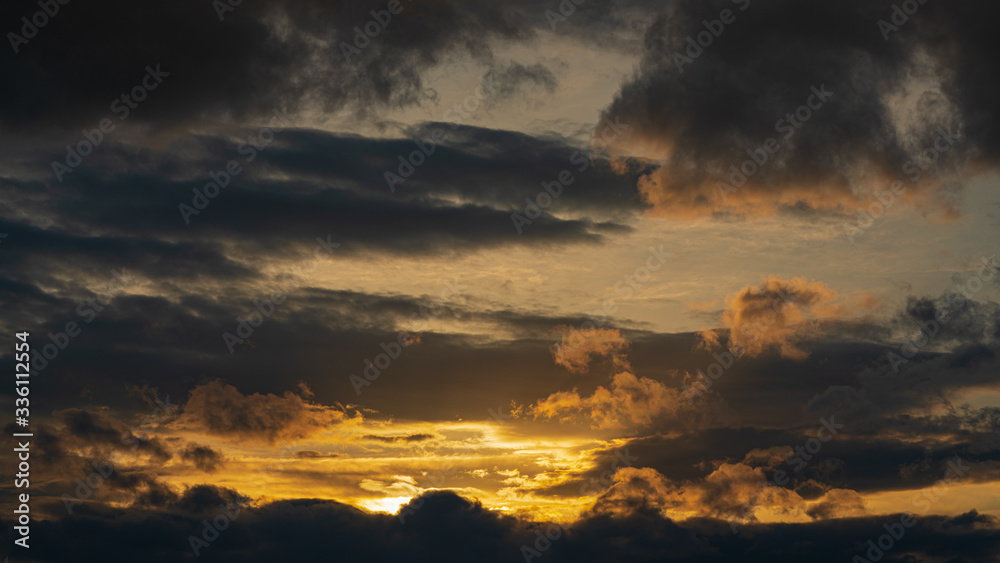 Dramatic clouds rising of sun floating in sky to change weather. Soft focus, blurred motion. Natural meteorology background. Heavenly landscape image ready for design, replace sky in photo editor.