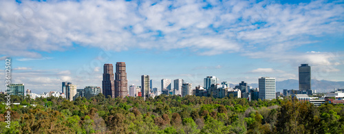 Fotografie Panoramic view of Mexico city skyline on sunny day.