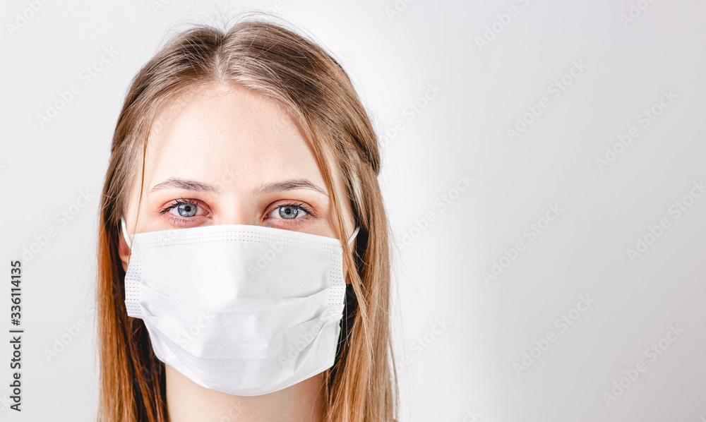 Woman with medical mask on face. Protection against viruses and infections. Stay home, corona virus. Woman with medical mask on face. Protection against viruses and infections. Stay home, corona virus.