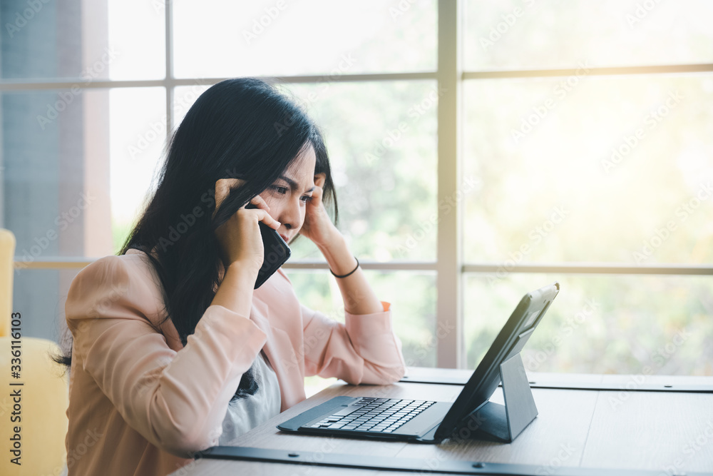 moody woman with tablet moody woman with tablet