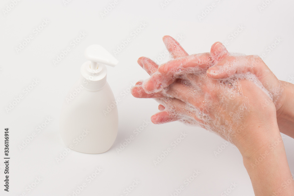 Fototapeta premium Closeup of children washing hands isolated. Cleanliness and body care concept. Global Handwashing Day Concept/Washing hands with soap