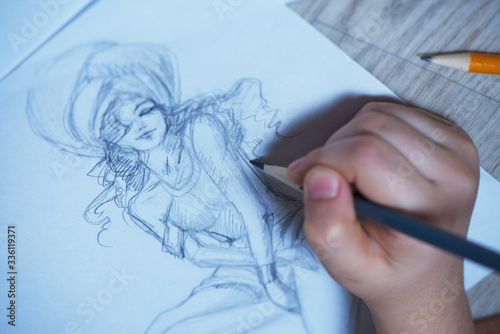 Sketches, sketching on white paper with a simple pencil. Colour pencils.
