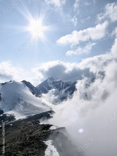 Fototapeta Naklejka Na Ścianę i Meble -  Clouds over the mountains