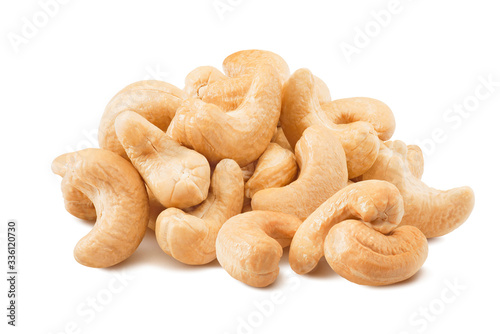 Big pile of cashew nuts isolated on white background photo