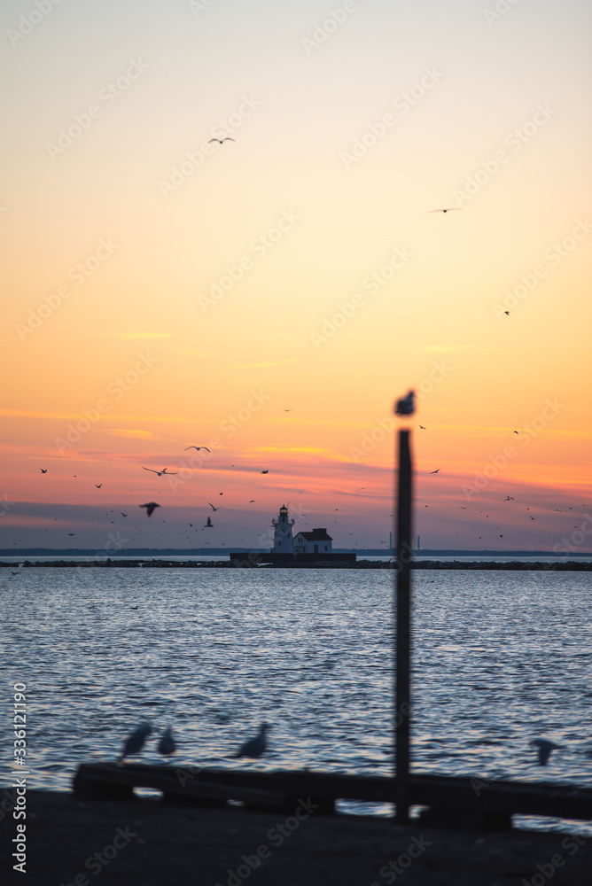 Sunset on Lake Erie with a lighthouse
