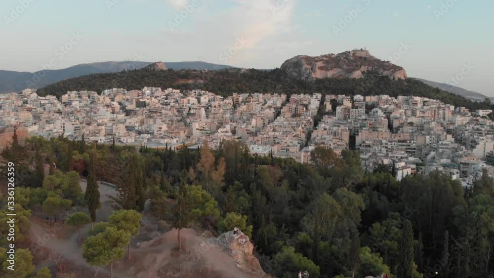 Sunset aerial view with a drone of buildings of the city of Athens in Greece Sunset aerial view with a drone of buildings of the city of Athens in Greece