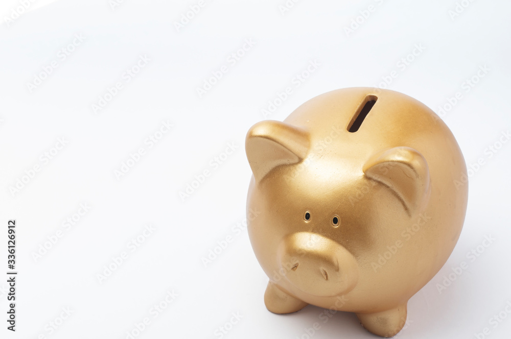 Gold piggy bank on white background. Saving concept Gold piggy bank on white background. Saving concept