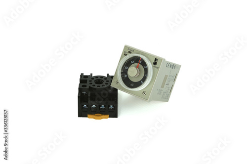 solid state time, multi range timer with socket isolate on white background. photo