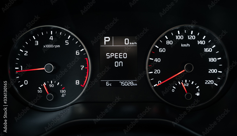 Car speedometer or meter panel. Dashboard close up.