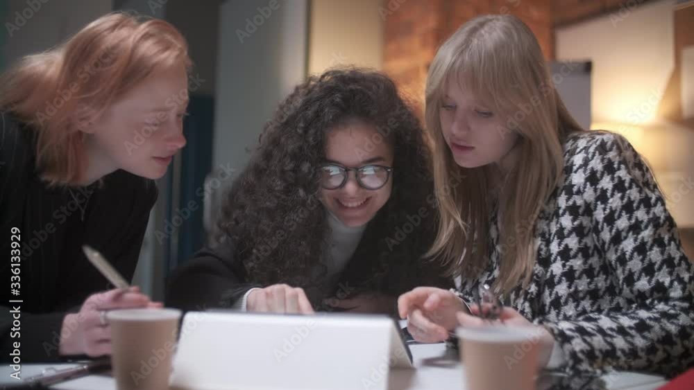 Portrait Of young Business Team At Work. Bright Contemporary Small Creative Business. Casual Young People In New Creative Business Office Or Architects Company. Portrait Of young Business Team At Work. Bright Contemporary Small Creative Business. Casual Young People In New Creative Business Office Or Architects Company.