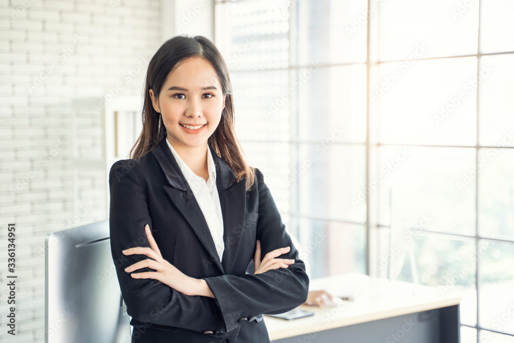 multiethnic asian female worker working strategy and planning in office portrait of her standing posing smiling, work concept of diversity of culture different race type of people co-working together multiethnic asian female worker working strategy and planning in office portrait of her standing posing smiling, work concept of diversity of culture different race type of people co-working together