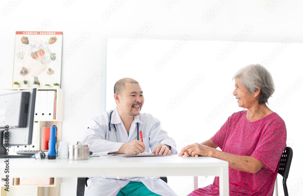 Fototapeta premium close up old asian woman, Asian doctor talk with old female patient about disease symptom, elderly health check up, happiness hospital