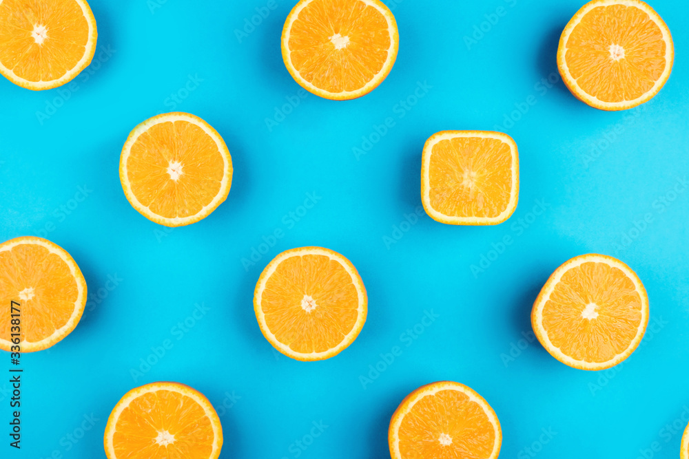 A square orange among round ones on a blue background. A square orange among round ones on a blue background.