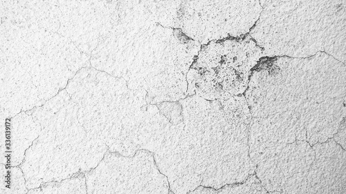 muro blanco roto, fondo de concreto ccemento, desgaste agrietada