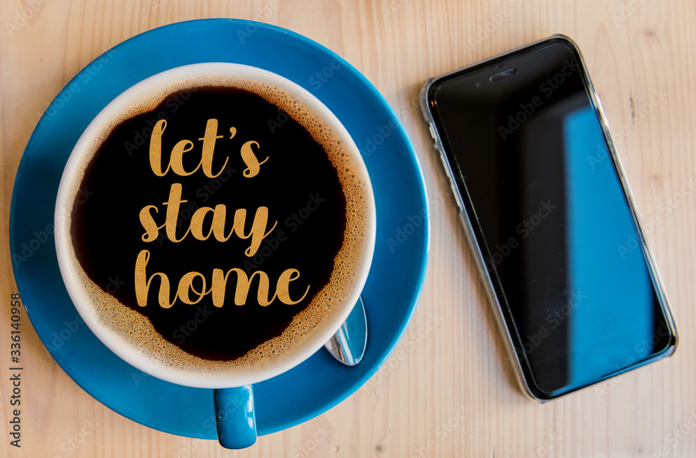 stay at home message in a coffee cup during covid-19 outbreak