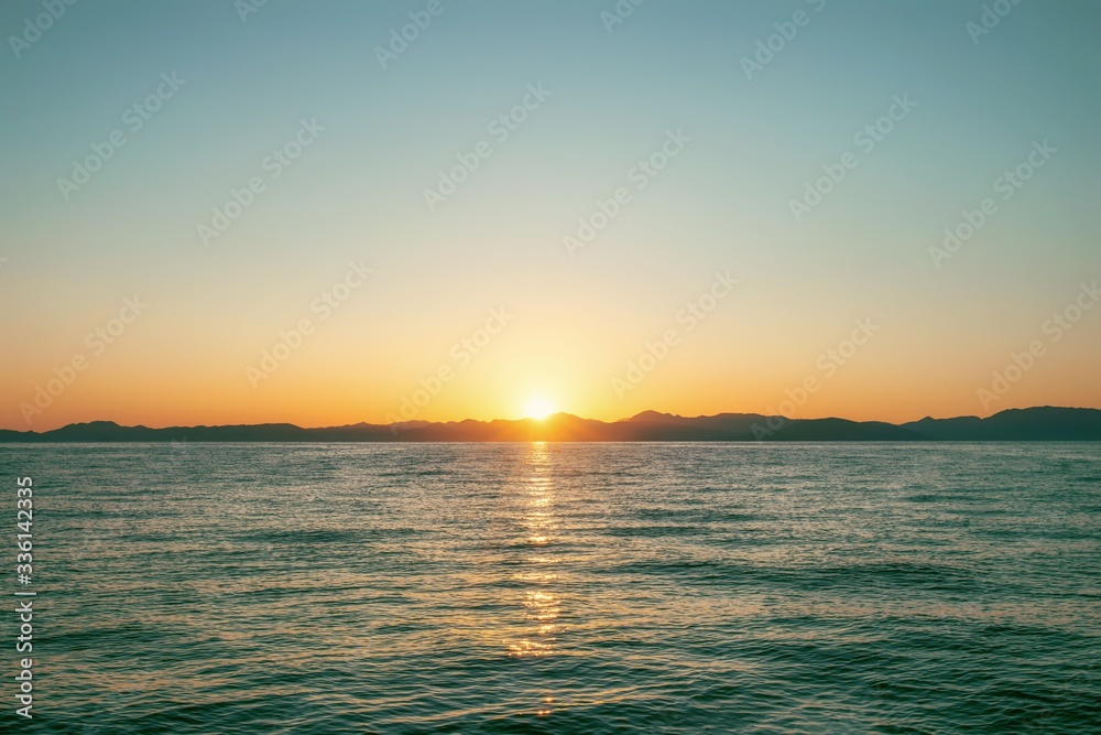 Sunset on Corfu Island in Ionian sea. Greece.