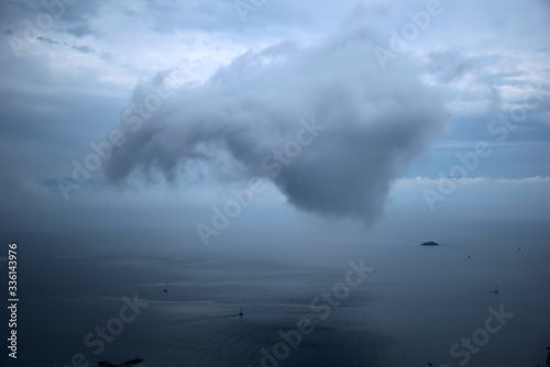  Skopelos island,Greece , 5/13/2019 , the port of Glossa, a cloud that looks like a dragon
