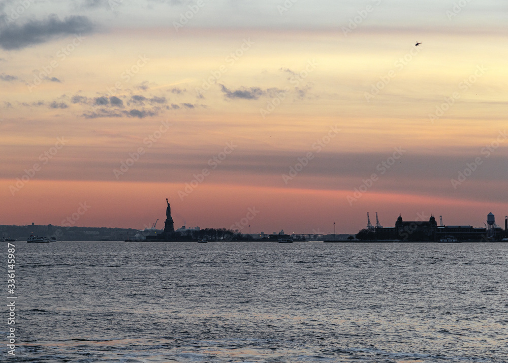 View on Statue of Liberty at sunset