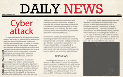 Closeup view of newspaper with headline CYBER ATTACK