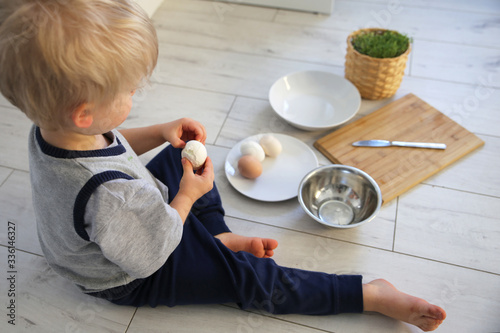 Little boy is cooking for easter