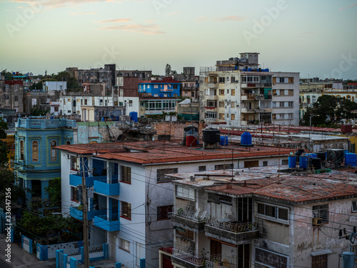 View of rooftops of houses in sunrise in Havana, Cuba