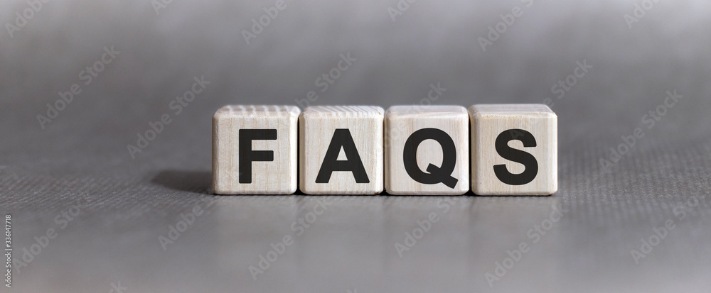 Obraz premium FAQS text on wooden cubes on a monochrome background