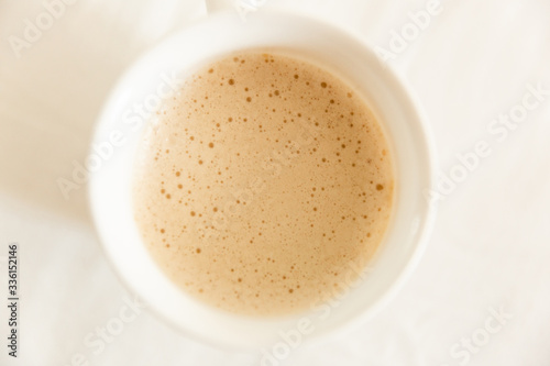 Glass Cup Of Coffee. Closeup Coffee With Milk. Cappuccino. Coffee foam