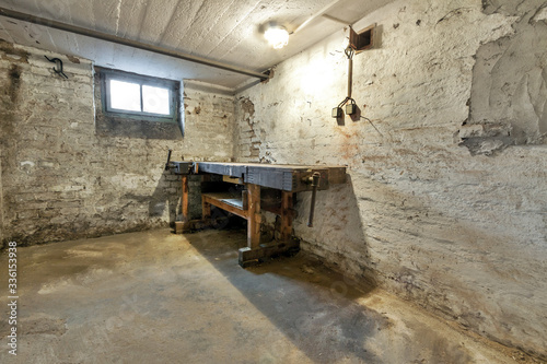 Abandoned empty old dark underground cellar