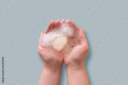 hands with soap and foam