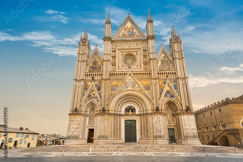 Exterior view of Orvieto Cathedral in the cathedral square, a 14th-century Gothic cathedral in Orvieto, Italy