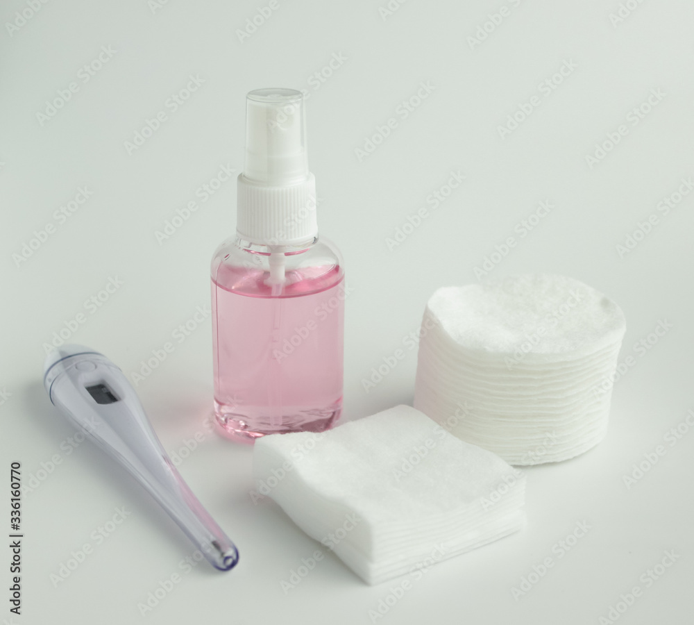 Protecting health from bacteria and viruses. Hand sanitizer, face mask and body thermometer. Protecting health from bacteria and viruses. Hand sanitizer, face mask and body thermometer.