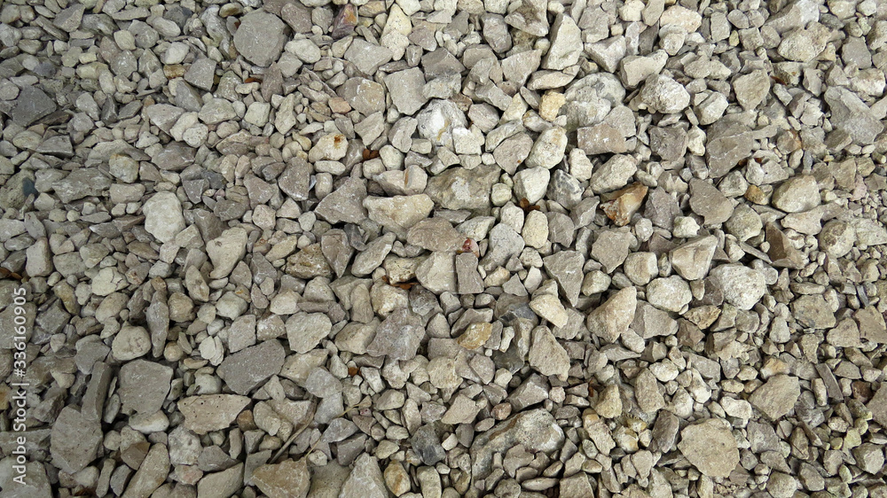 Natural background. Track made of gray stones Natural background. Track made of gray stones
