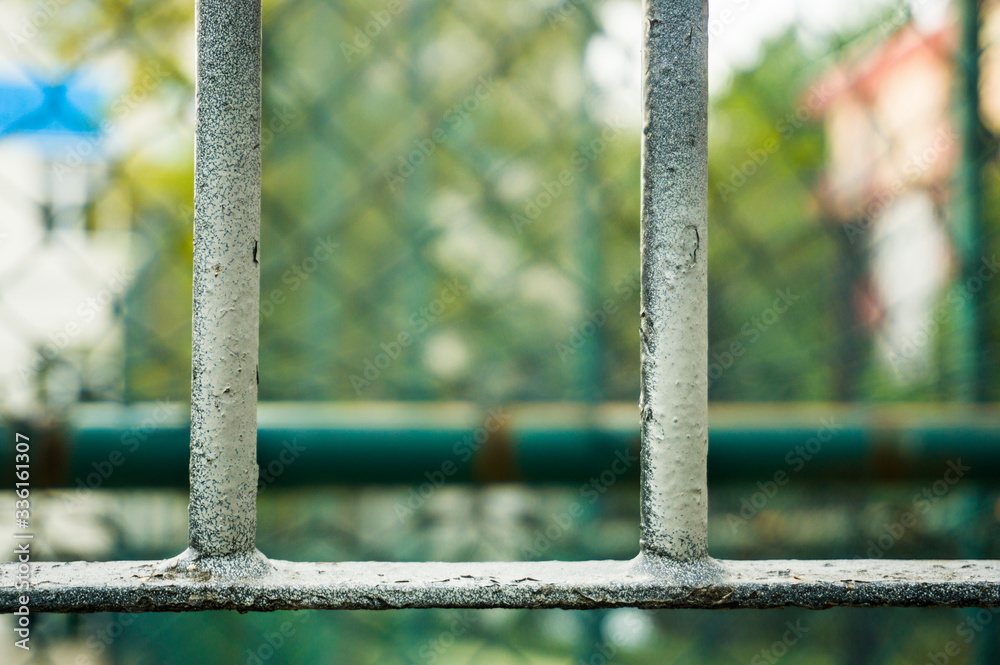 Iron fence of a prison to prevent prisoners from escaping. It is the end of the road. No exit. No more way. Iron fence of a prison to prevent prisoners from escaping. It is the end of the road. No exit. No more way.