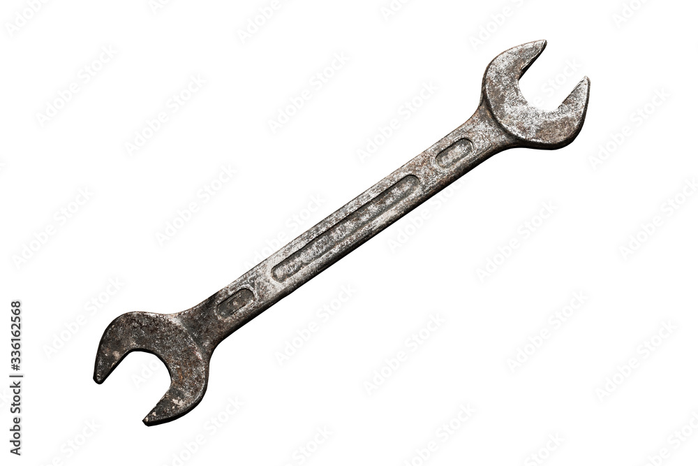 Rusty metal wrench. Grunge spanner isolated on white. Mechanic tool background. Rusty metal wrench. Grunge spanner isolated on white. Mechanic tool background.