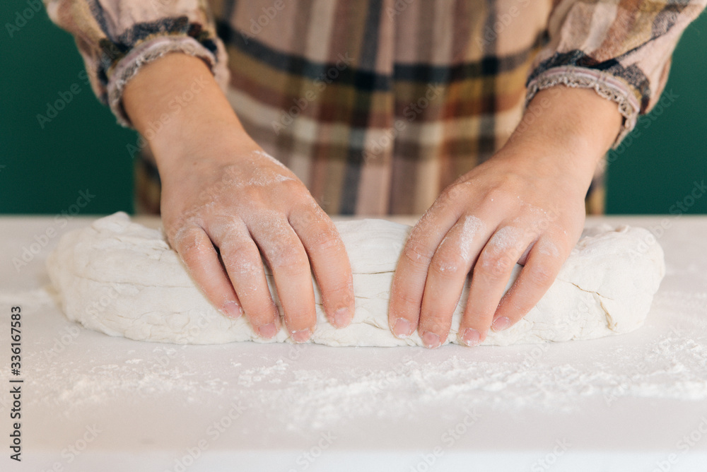 Woman prepares to her home handmade dough for bread, homemade cooking. Woman prepares to her home handmade dough for bread, homemade cooking.