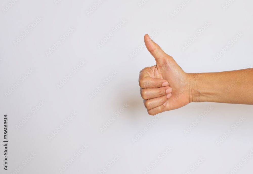The finger of a woman showing the meaning on a white background