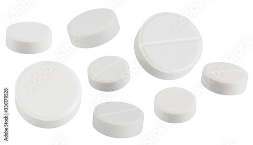 white textured pills isolated on white
