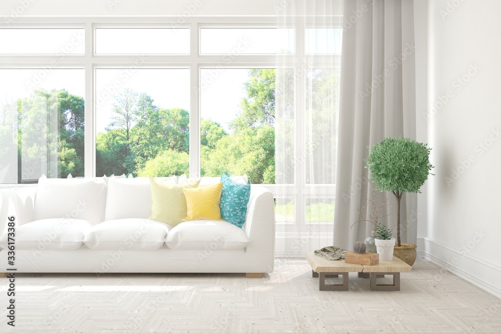 Fototapeta premium White living room with sofa and summer landscape in window. Scandinavian interior design. 3D illustration