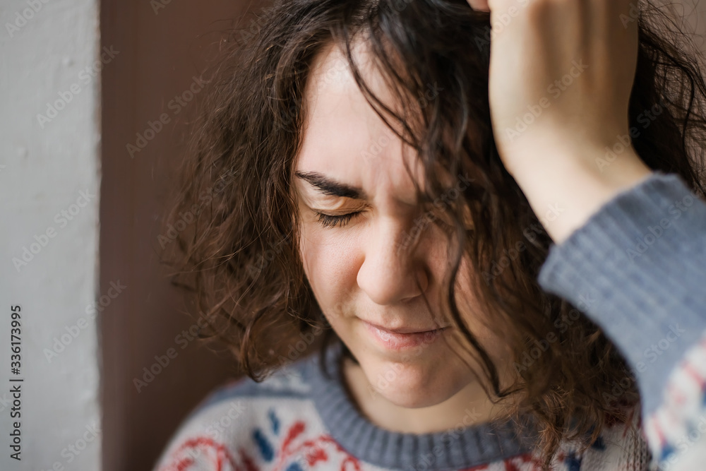 Fototapeta premium girl has a headache